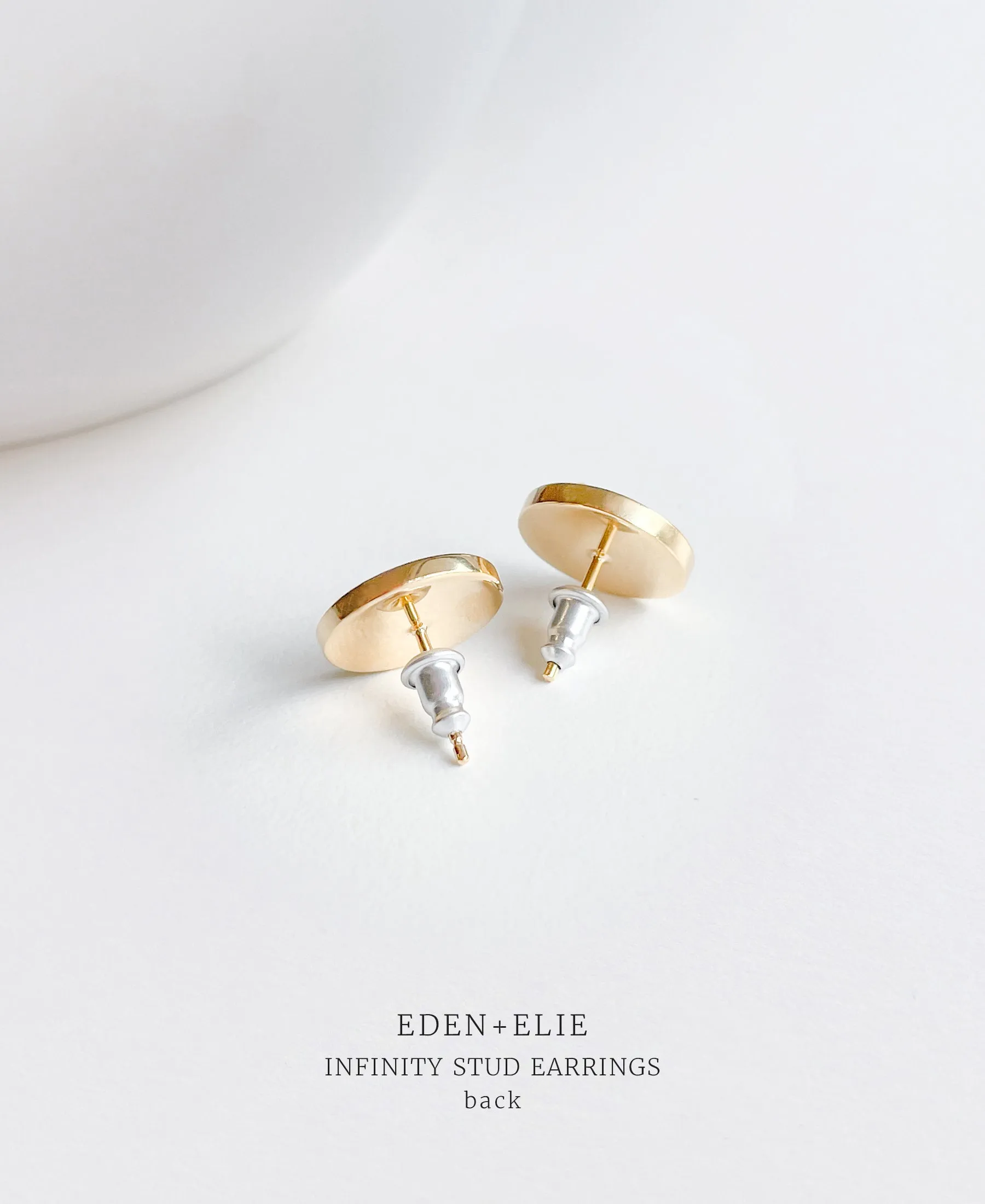 EDEN   ELIE Infinity stud earrings - nectar