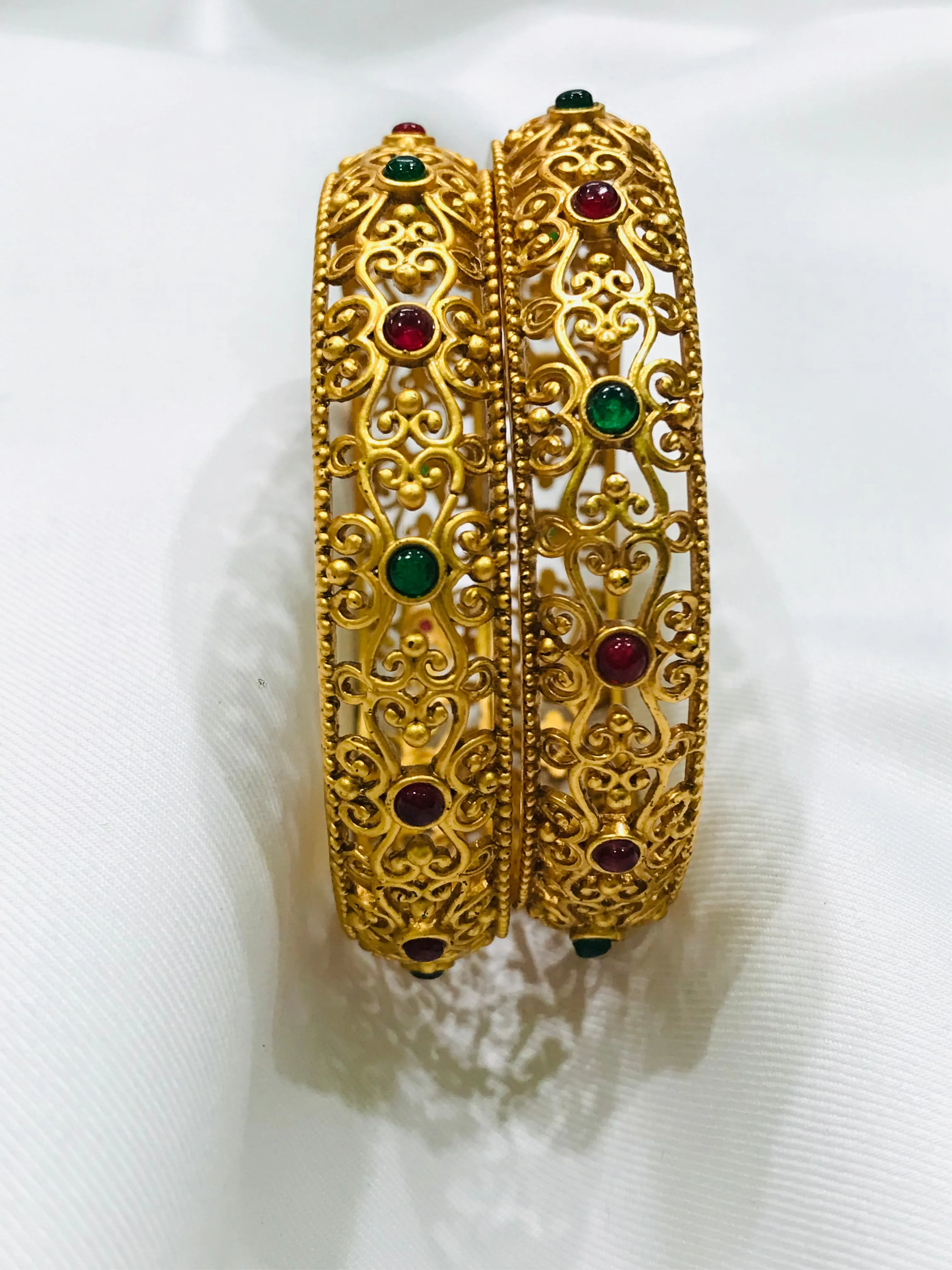 Elegant Floral Matte Finished Antique Gold Bangle Set With Multicolor Stones