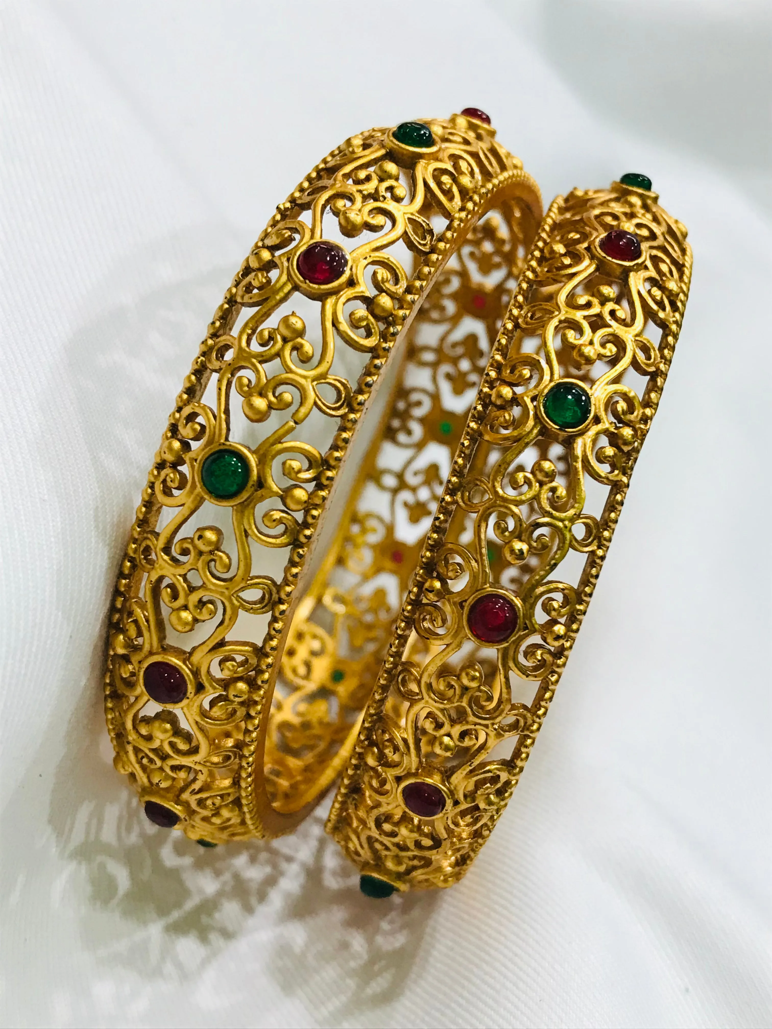 Elegant Floral Matte Finished Antique Gold Bangle Set With Multicolor Stones