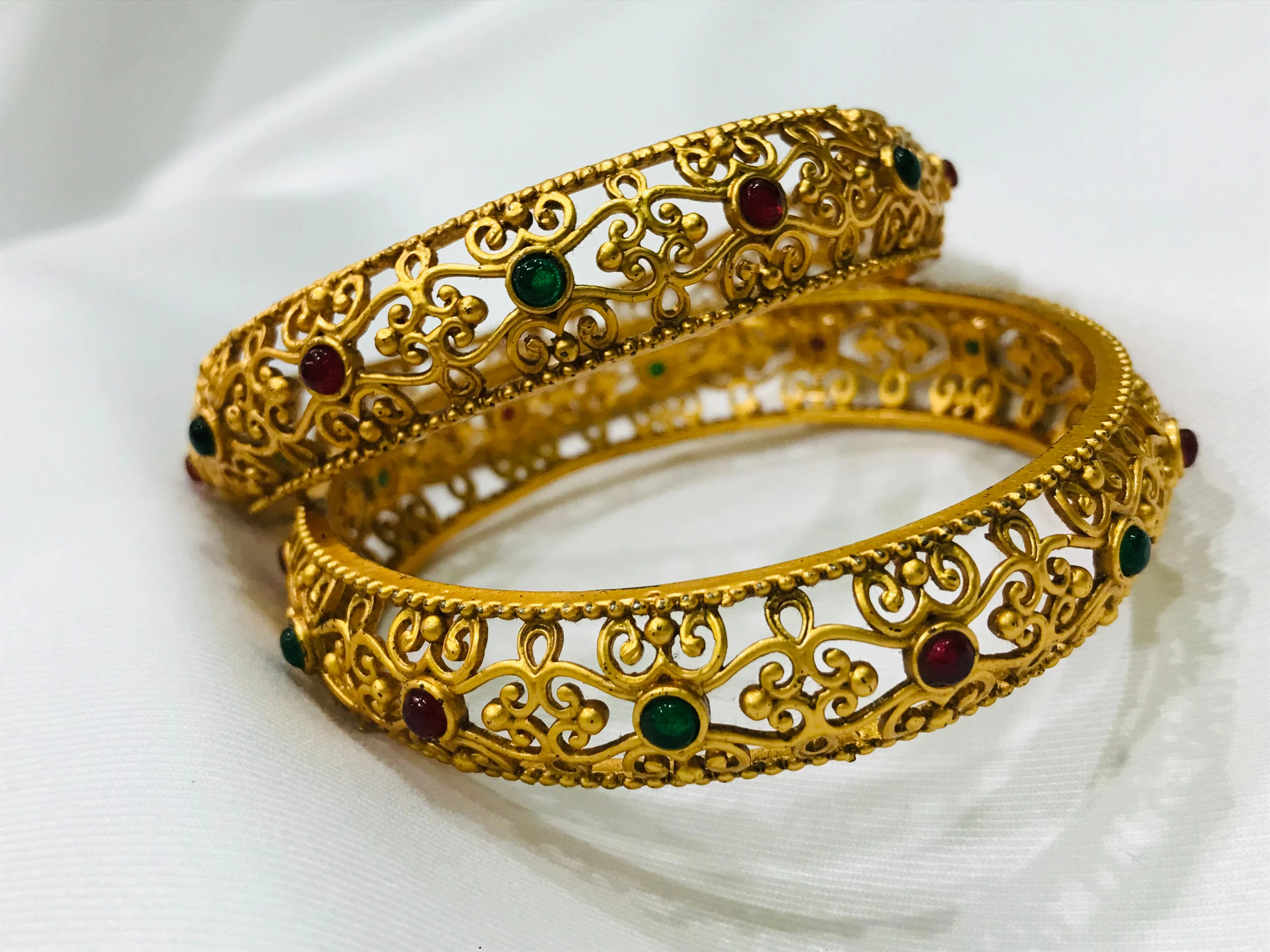 Elegant Floral Matte Finished Antique Gold Bangle Set With Multicolor Stones